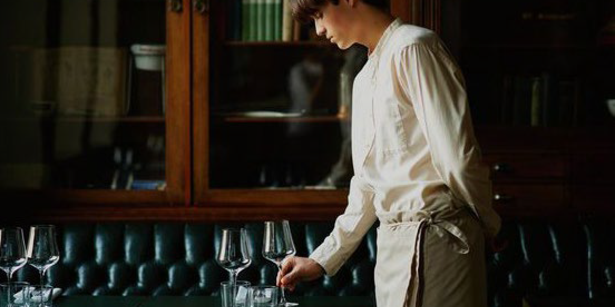 Waiter setting table